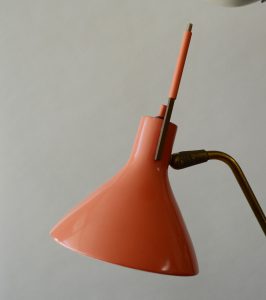 Adjustable shade on Gerald Thurston lamp.