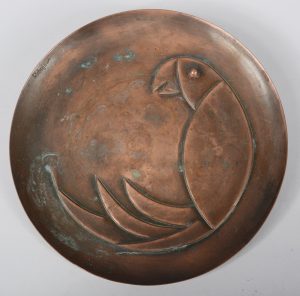 Rebajes copper plaque with art deco parrot